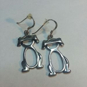 Dog with bone earings